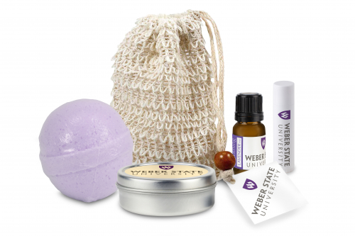 Loofah Bag with Bath Bomb, Candle Tin, Essential Oil, and Lip Balm